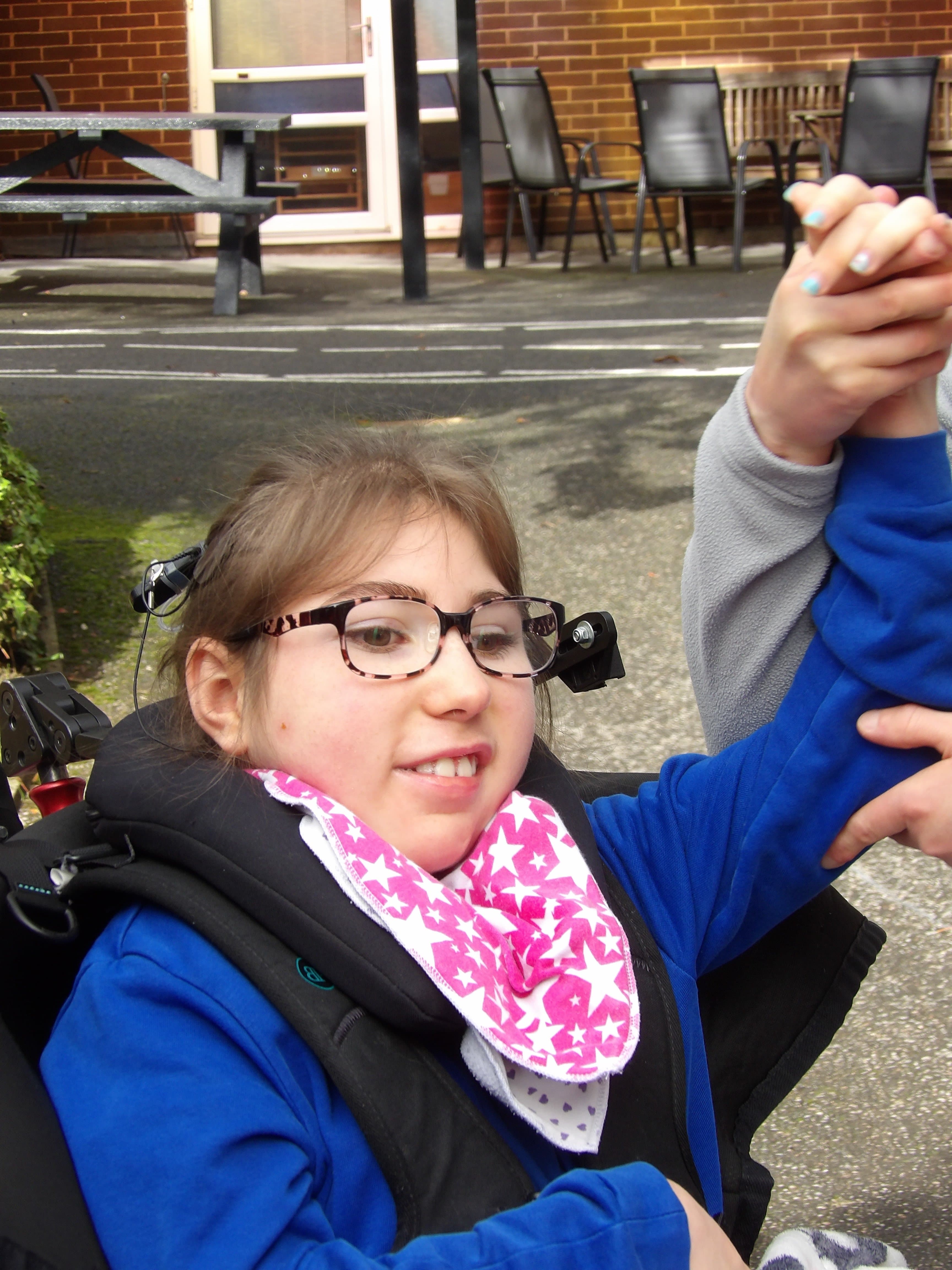 Girl smiling outdoors